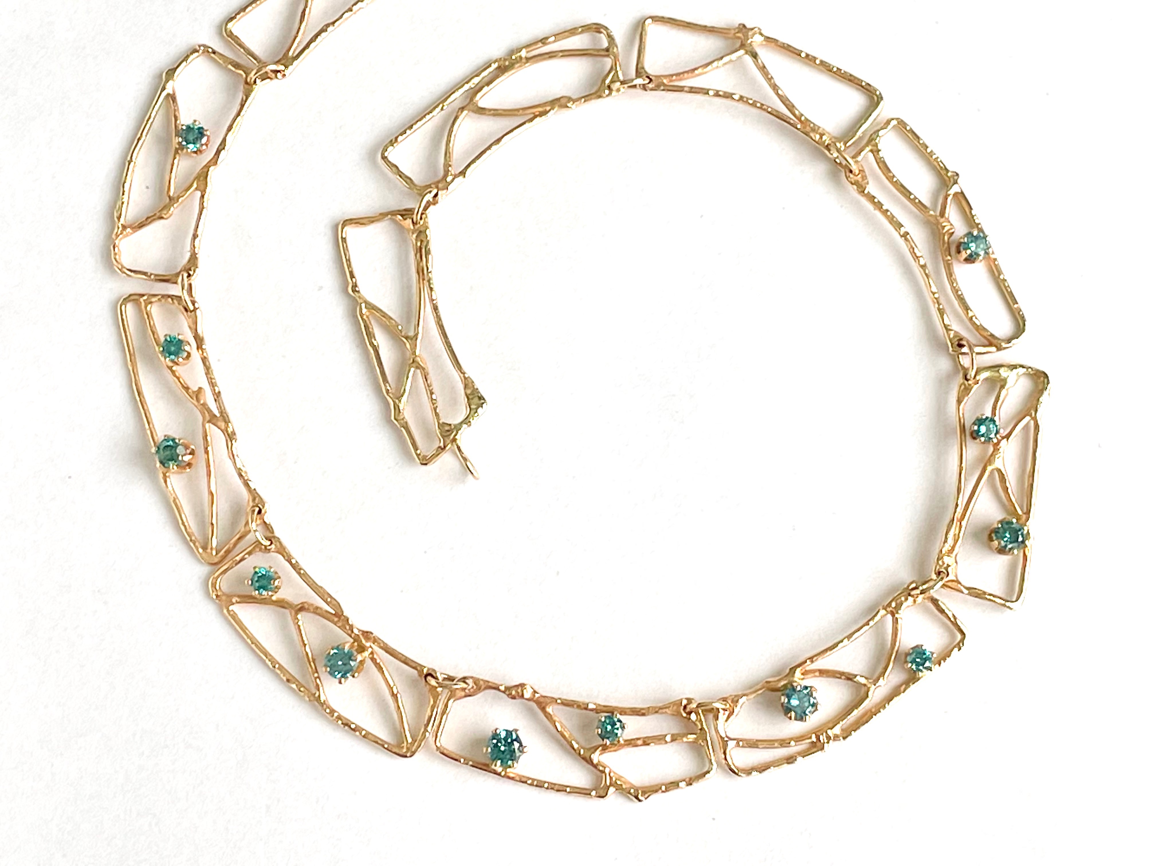 14k gold necklace with teal colored diamonds 231